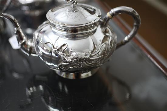 A Chinese four piece silver tea set,